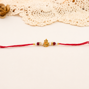 Divine Ganesha Golden Charm Rakhi
