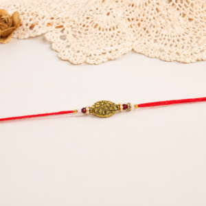 Royal Antique Golden Charm Rakhi